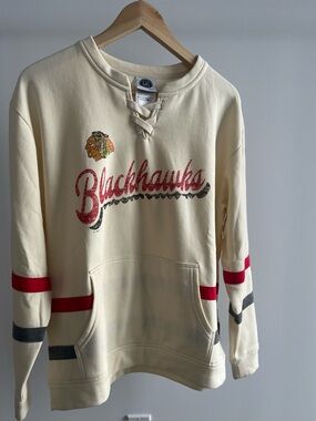 Officially licensed NHL Chicago Blackhawks Cream Lace-Up Pullover Sweater